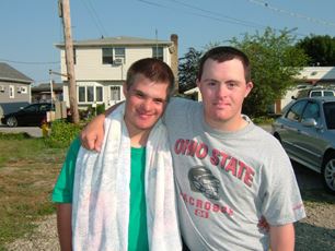 Two athletes take a photo